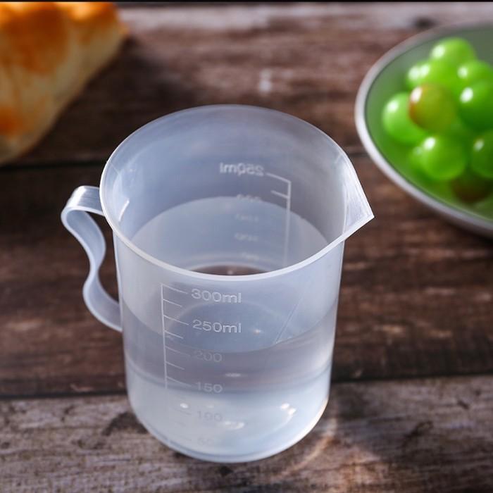 Free Gelas Ukur Plastik 300ml