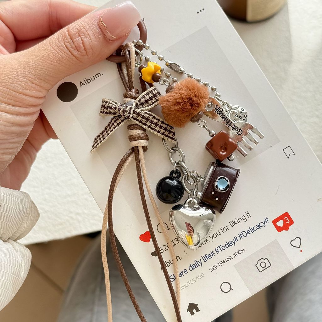 Fashion new original retro miu hairball bag hanging personality camera keychain pendant, exquisite