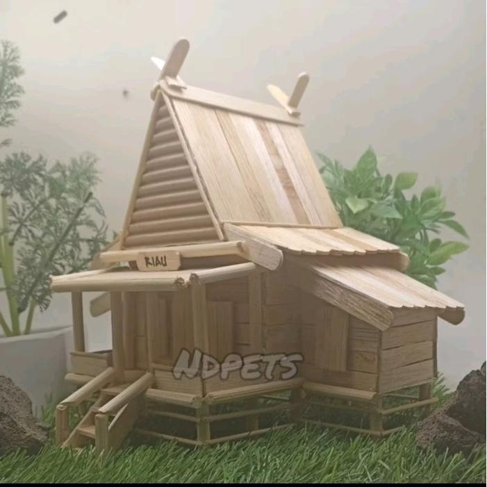 ` miniatur rumah adat Riau stik es krim