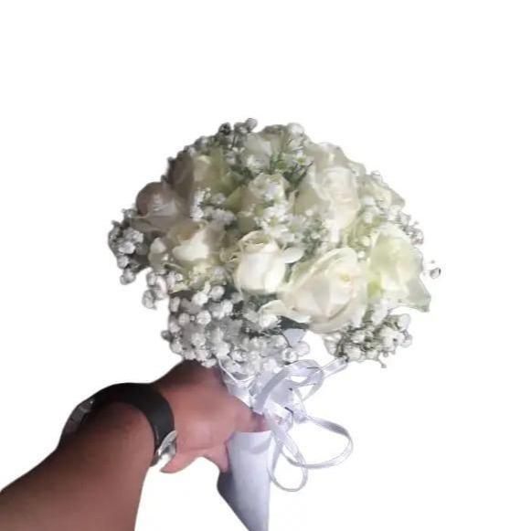 Buket bunga pengantin bunga asli dan fresh fresh flower warna bunga bisa di ganti pinkmerah