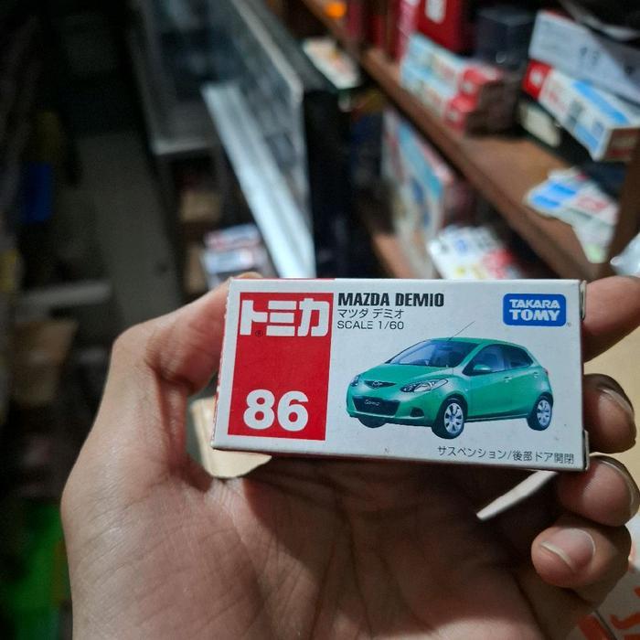 Tomica No 86 Mazda Demio Green 2010 scale 1/60