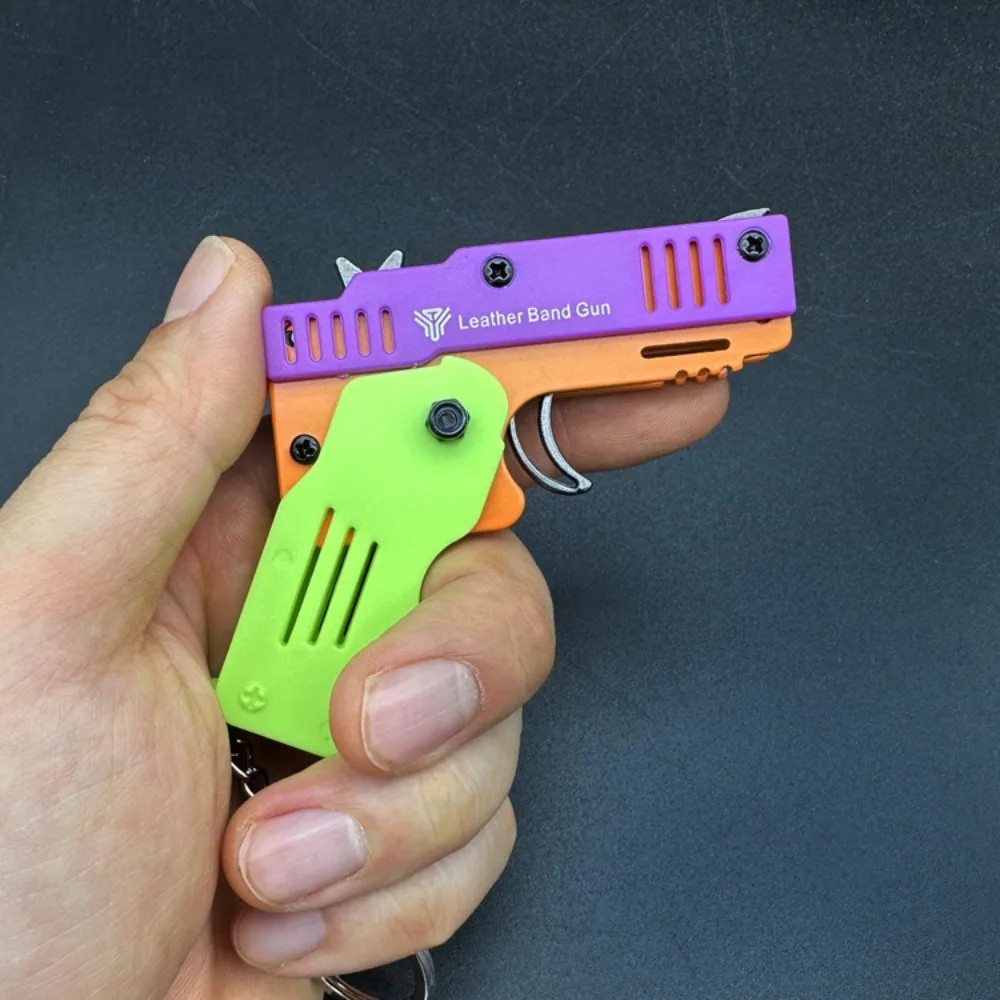 kids guns Toy 50 Rubber Shooting Keychain mini toys for boys fake Gun Gift Folding Pendant pistolas 
