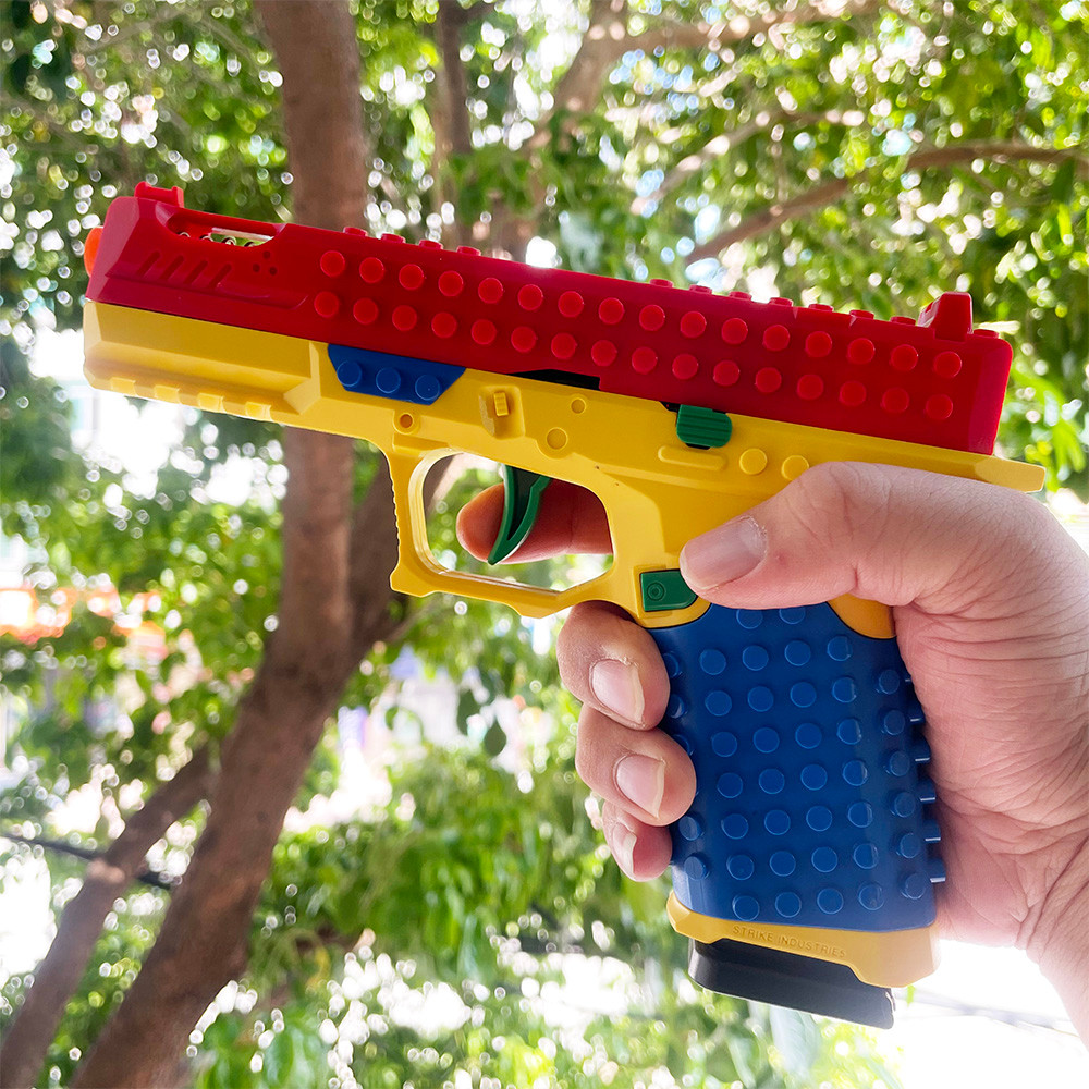 Building Block Pistol Shell Throwing Continuous Firing Airsoft Blowback Empty Hanging Toy Gun