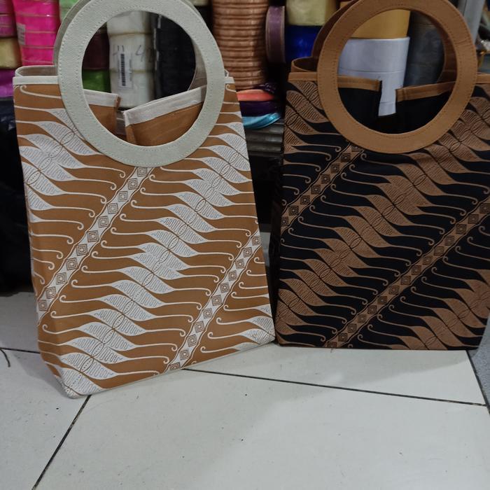 Tas Spunbond Oval Bahan Tebal Buat Nasi Kotak 22 Isi 12 Pcs