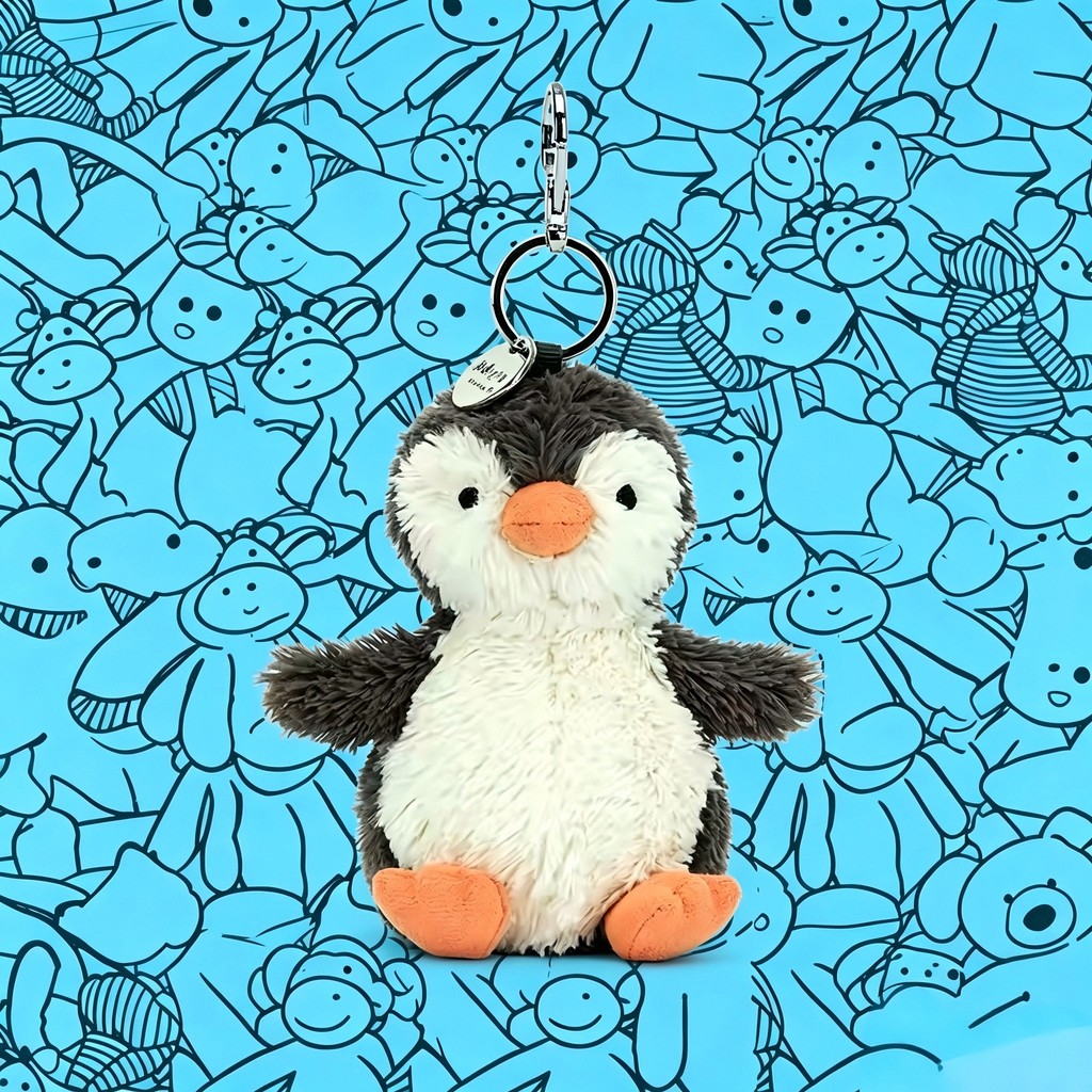 JC Cotton candy, tea bag, cherry, peanut, dragon, crepe, croissant, capybara bag, keychain, and
