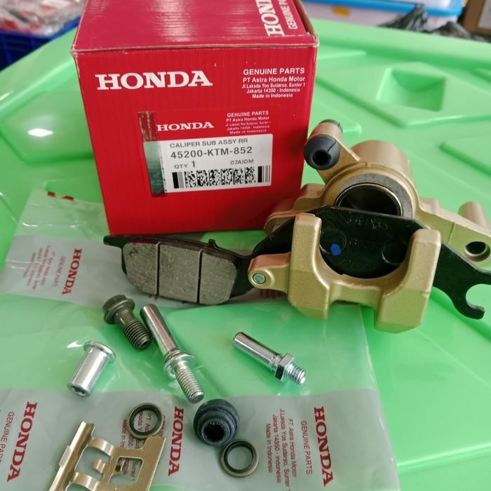 KALIPER BELAKANG CAKRAM ASSY (HONDA) SUPRA X 125 HELM IN , BLADE NEW, SUPRA X 125 (45200-KTM-852)