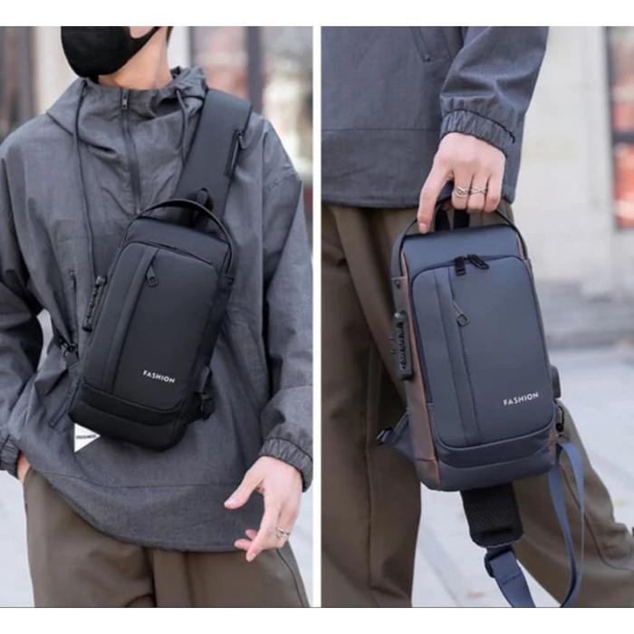 

NewFS - Tas Selempang Pria Premium Multifungsi USB Anti Maling