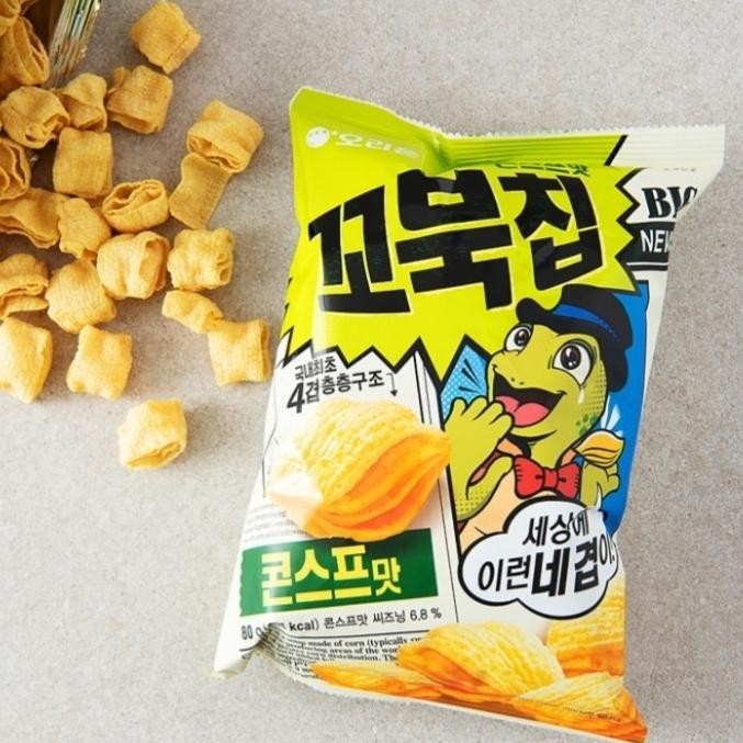 

ORION MAKANAN RINGAN EKSTRUDAT JAGUNG / TURTLE CHIPS 80GRAM