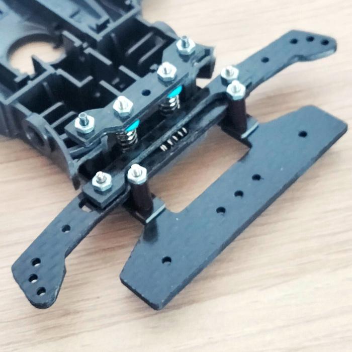 Rear AT Sliding Bumper Carbon - Tamiya STO