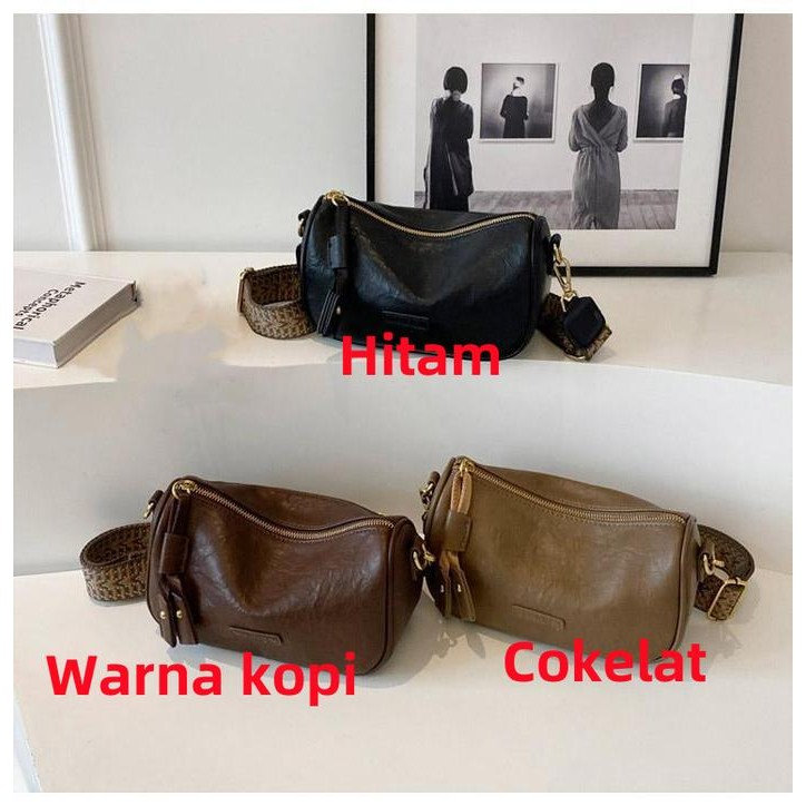 Top 2025 model tas bantal Boston yang sedang tren, dengan tali bahu lebar, tas selempang wanita, tas