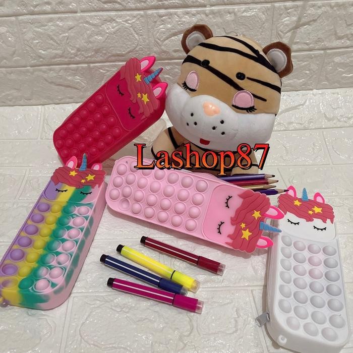 

Kotak pensil pop it unicorn Alat