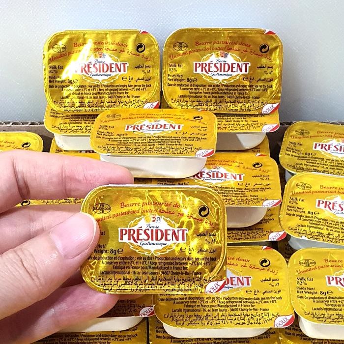 

Pilihan- Butter Portion Unsalted President 8G (Pack Isi 10 Mini Cups)