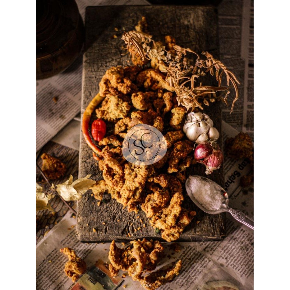 

KERIPIK KULIT AYAM CRISPY 1KG EXTRA DAUN JERUK