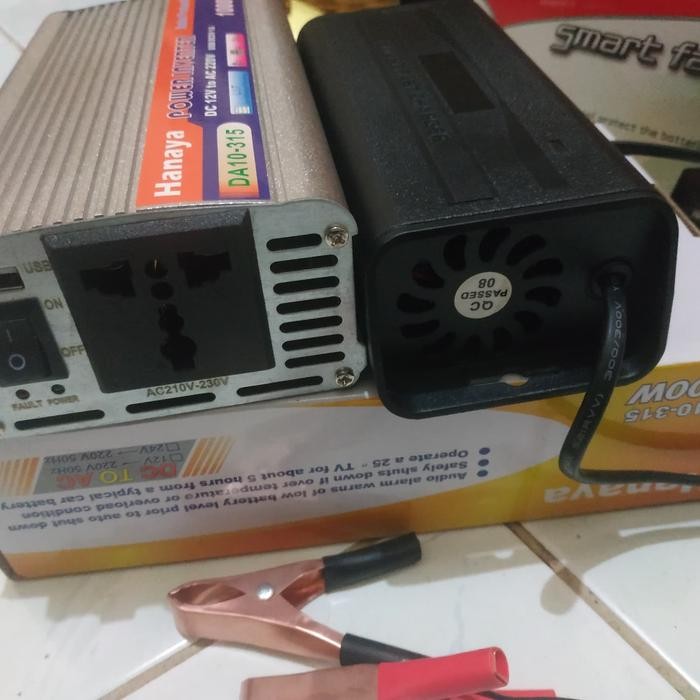 Power inverter 1000 Watt Plus Charger Aki Accu 5 ampere 12V