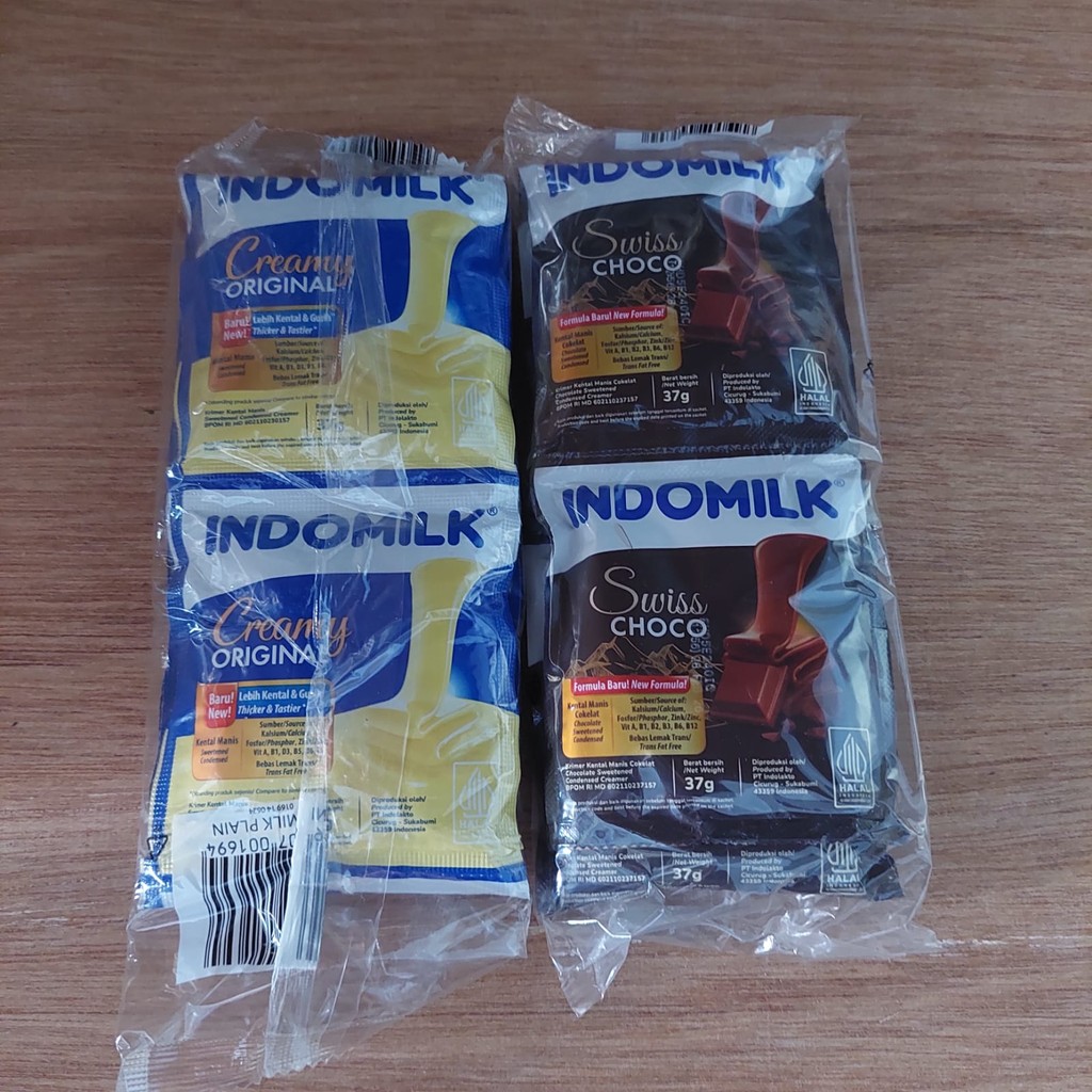 

Susu Kental Manis Indomilk Kemasan Pack Isi 6 Sachet Creamy Original (Plain) dan Cokelat
