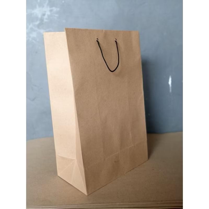 

Paperbag polos coklat ukuran 18x11x30 (paket 12pcs)|Tas Kertas |Tas Kado |Tas Souvenir |paper bag custom