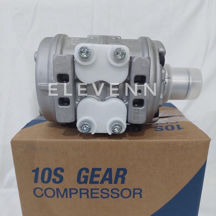 COMPRESOR KOMPRESOR COMPRESSOR AC MOBIL TARUNA FUTURA STARLET LASER