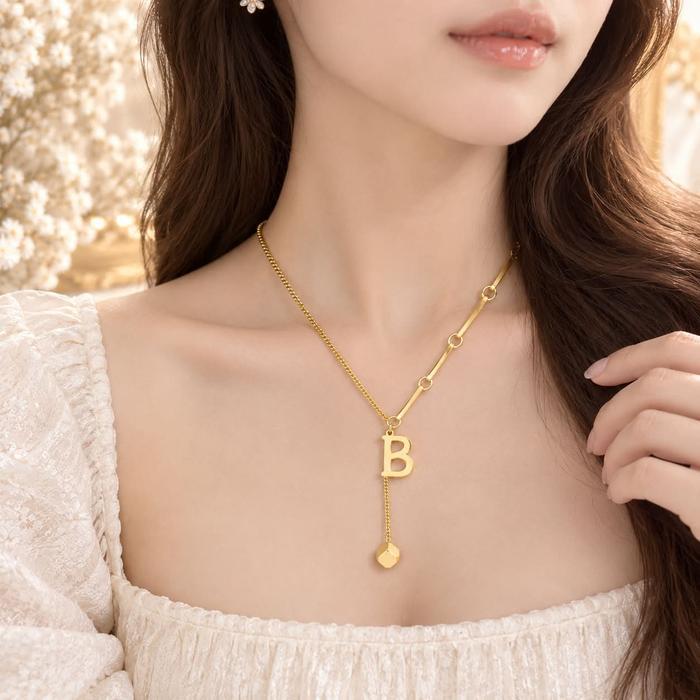 READY Kalung Titanium Liontin Huruf Anti t & Anti Luntur