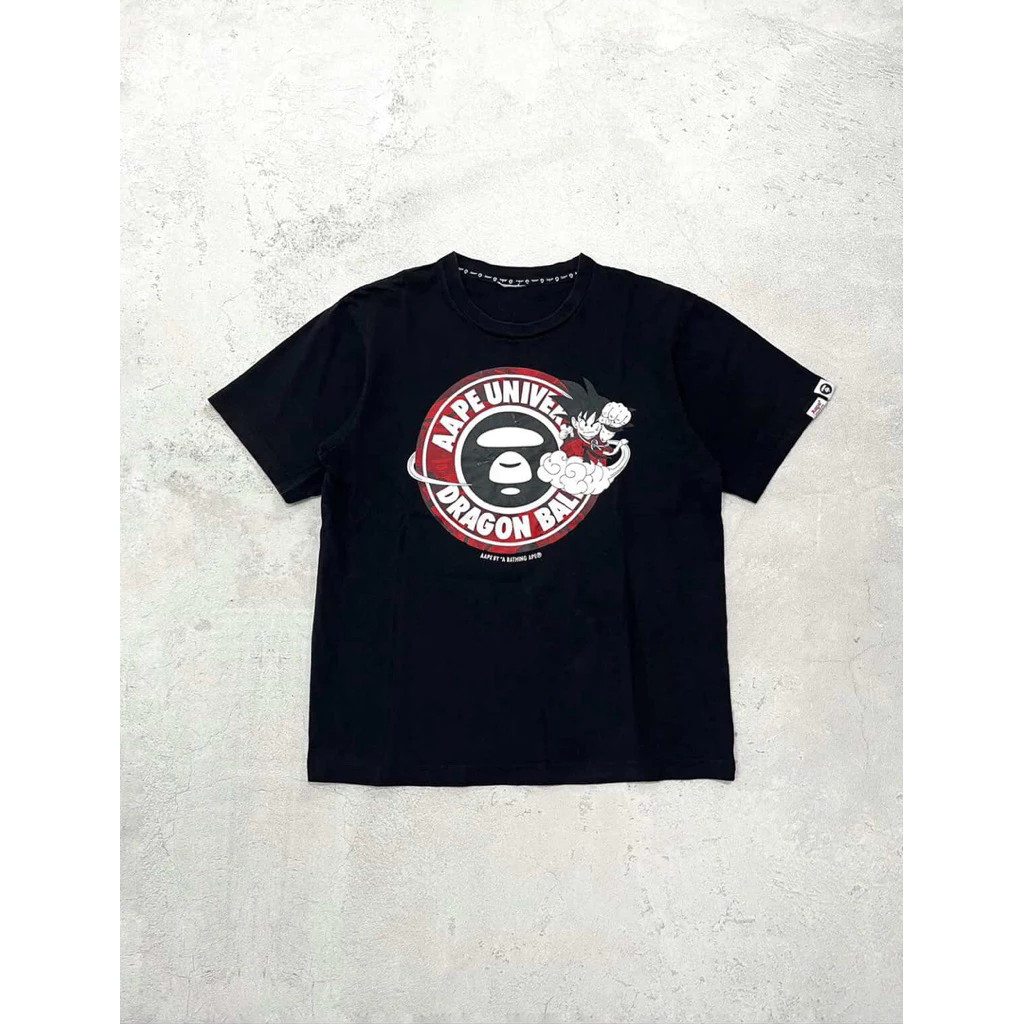 Kaos Oversize Pria Wanita Sablon Kolaborasi Aape x Dragon Ball Goku Motif Lingkaran Merah Hitam