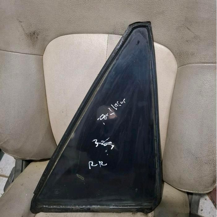 kaca segitiga kaca mati pintu belakang kanan Ford laser 1.3 86-97