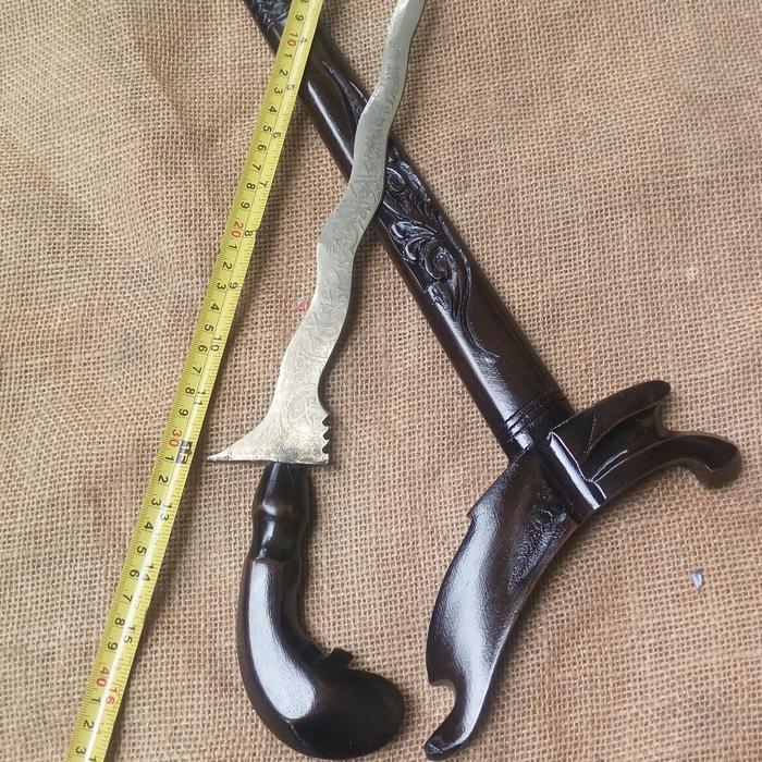 Keris Kuningan Besar Kaligrafi