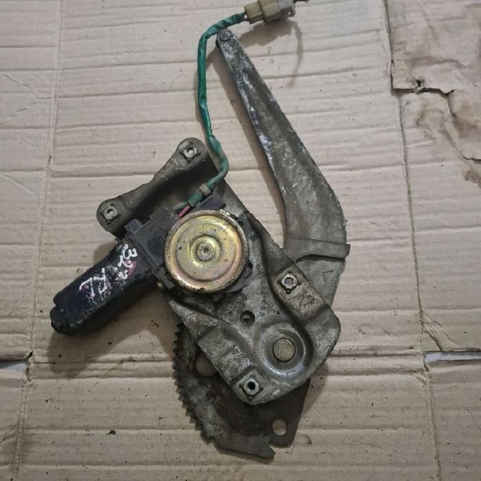 motor dnamo regulator power window pintu belakang kiri Mazda 323 86-88 Ford laser