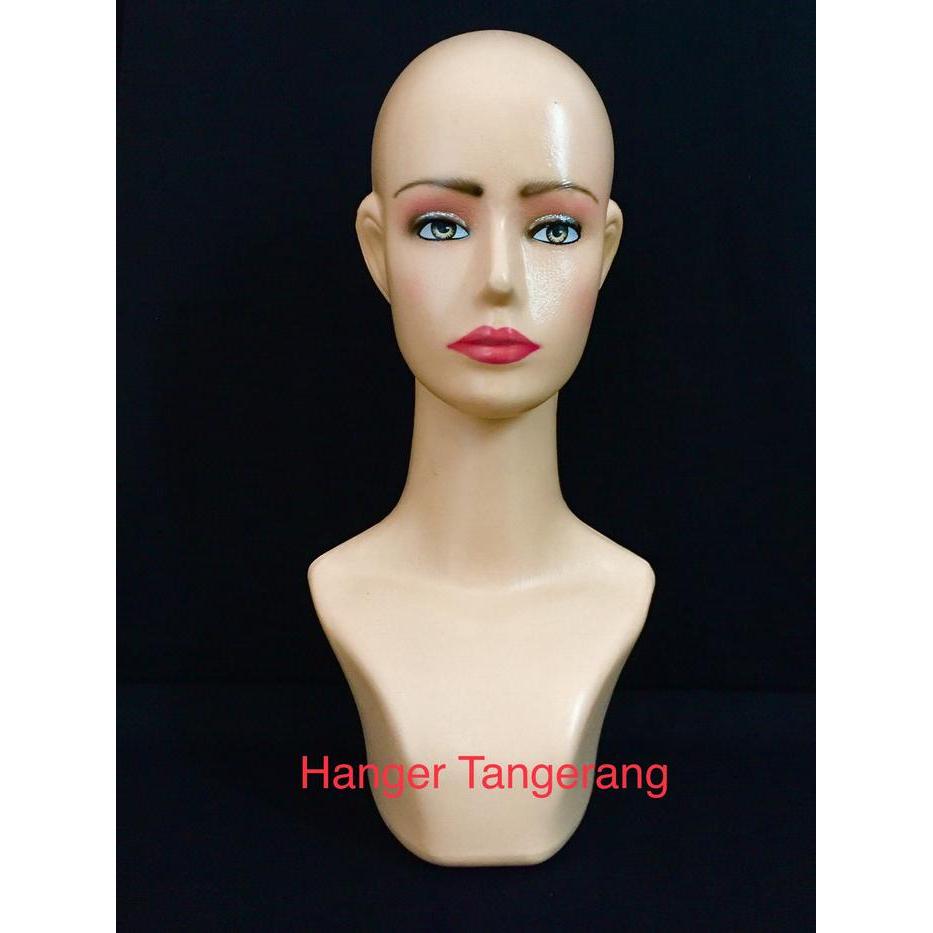 Patung Kepala Dewasa