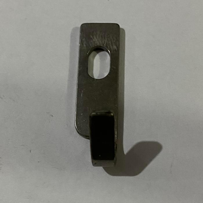 Tahanan jarum pasang kancing juki 373