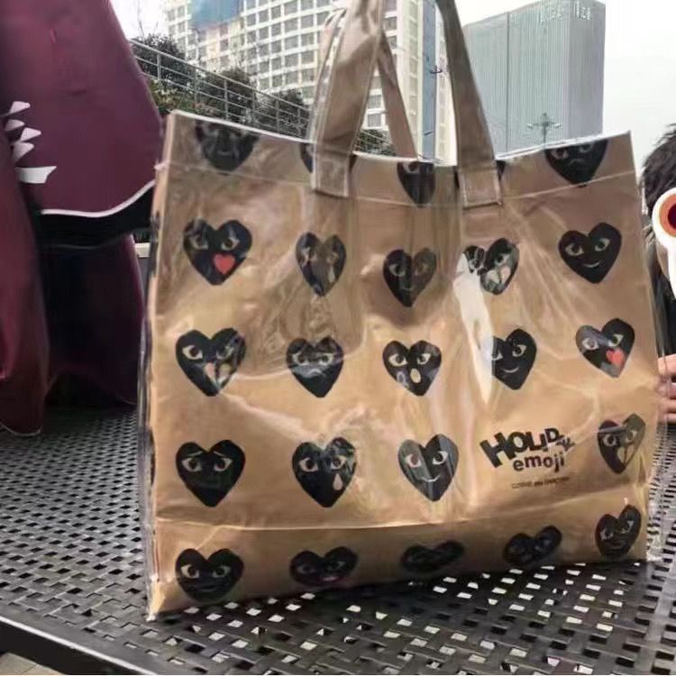 Sera trendy all-match one-shoulder heart handbag PVC transparan tas belanja kertas kraft berkapasitas besar siswa tote bag