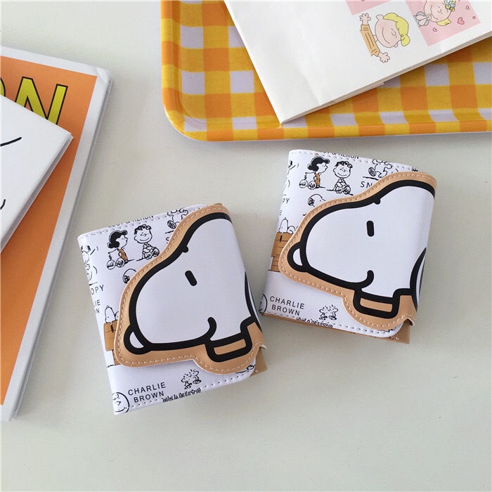 Sera ins gaya Jepang dan Korea lucu Snoopy dompet pendek multi-fungsi tombol jepret tiga kali lipat PU kartu tas wanita dompet koin