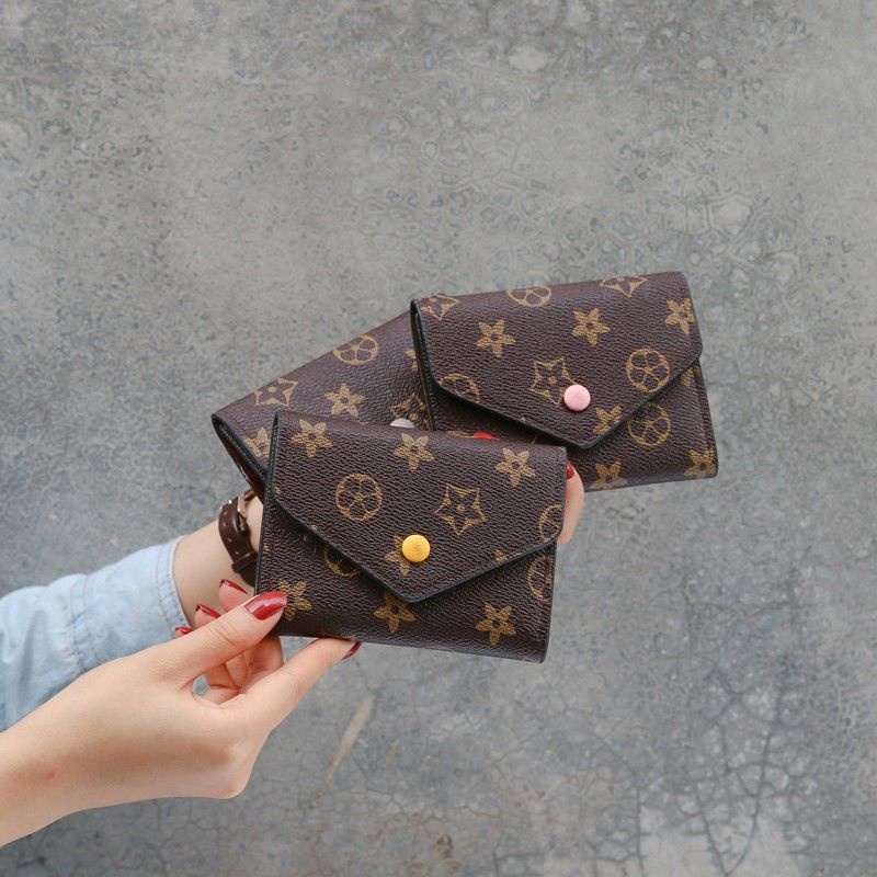 Sera Eropa dan Amerika nama besar wanita baru dompet kecil wanita pendek retro tas kartu kacang polong tren fashion mini dompet dompet