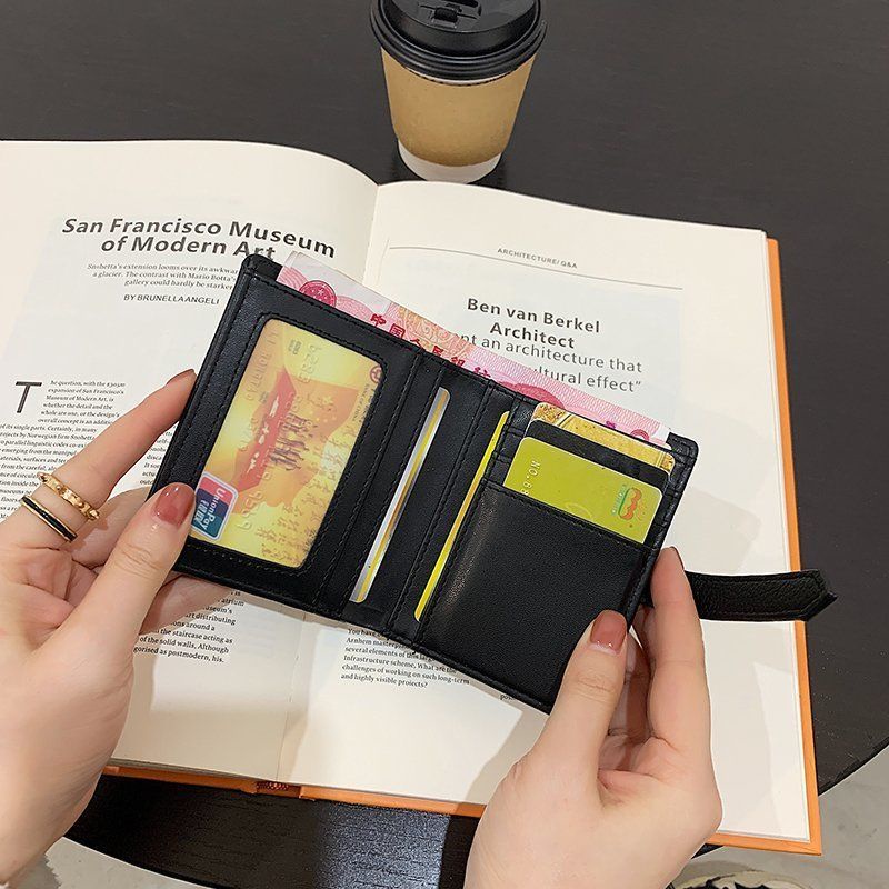 Sera dompet wanita 2023 baru ringan dan tipis 20% off net red short wallet niche siswa pendek high-end sense card tas wanita