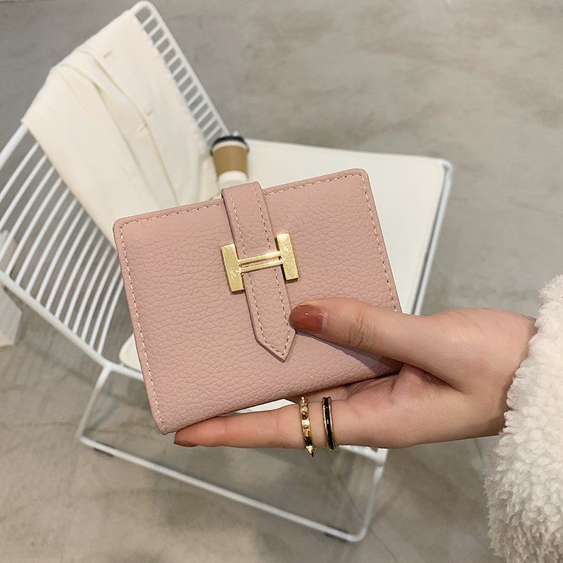 Sera dompet wanita 2023 baru ringan dan tipis 20% off net red short wallet niche siswa pendek high-end sense card tas wanita