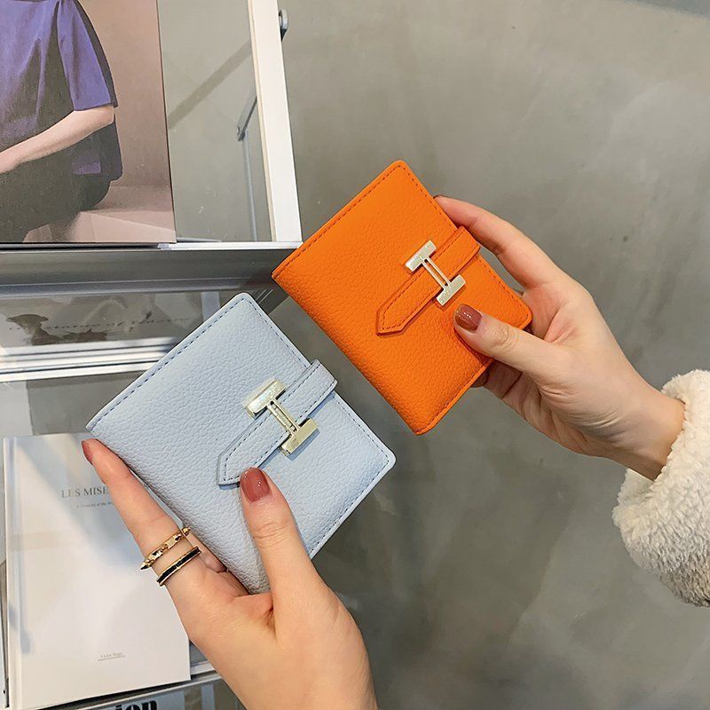 Sera dompet wanita 2023 baru ringan dan tipis 20% off net red short wallet niche siswa pendek high-end sense card tas wanita