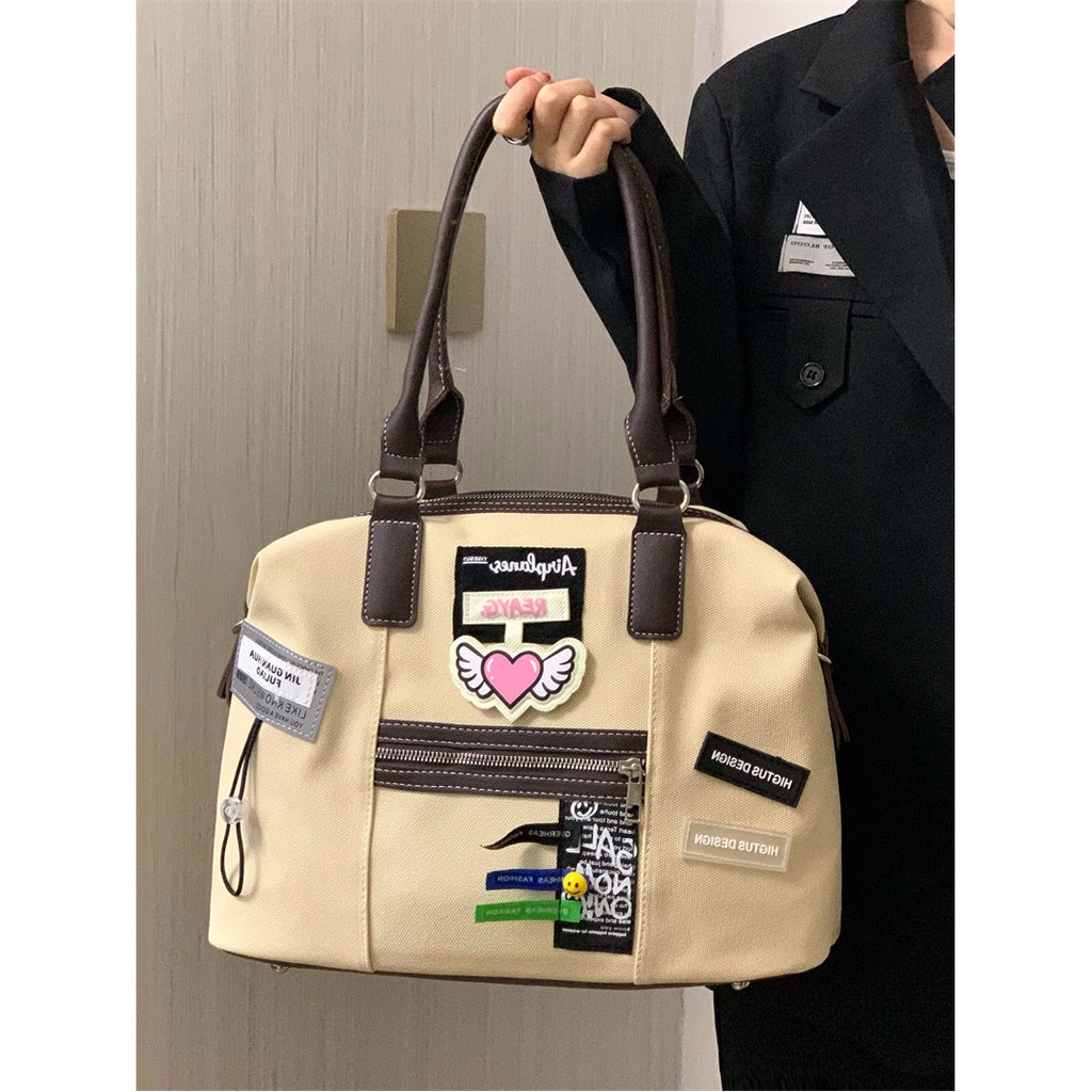 Sera Niche Desain Retro Kreatif Label Tas Wanita 2023 Baru Kasual Komuter Tote Tas All-Match Tas Kurir Tren