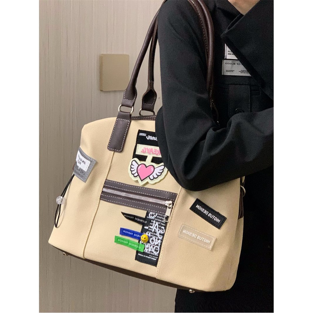 Sera Niche Desain Retro Kreatif Label Tas Wanita 2023 Baru Kasual Komuter Tote Tas All-Match Tas Kurir Tren